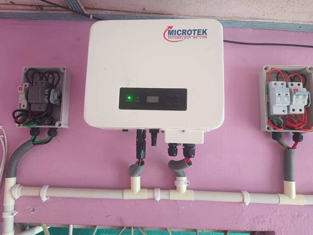 Microtek solar inverter wall-mount installation with ACDB/DCDB protection boxes